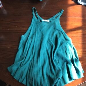 Flowy tank top with low cut sleeves